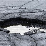 On-Street Bike Lane - Repair at 4595 128 Av NE