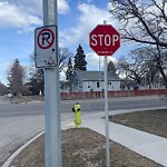Sign on Street, Lane, Sidewalk - Repair or Replace at 317 15 Av NE