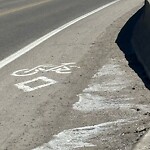 On-Street Bike Lane - Repair at 1596 8 Av NE