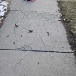 Sidewalk or Curb - Repair at 502 7 A St NE
