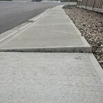 Sidewalk or Curb - Repair at 63 Masters Pt SE