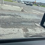 Pothole Repair at 11289 Metis Tr NE