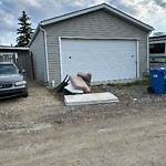 Debris on Backlane at 6008 8 Av SE