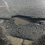 Pothole Repair at 6448 Old Banff Coach Rd SW