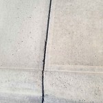 Sidewalk or Curb - Repair at 281 Kincora Glen Ri NW