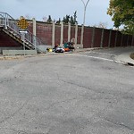 Debris on Street, Sidewalk, Boulevard at 2415 14 Av NW