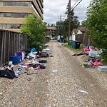 Debris on Backlane(OLD) at 2710 17 Av SE