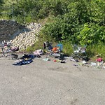 Debris on Street, Sidewalk, Boulevard at 2450 10 Av SW