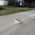 Sidewalk or Curb - Repair at 306 Cedar Crescent SW