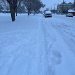 Snow On City-maintained Pathway or Sidewalk-WAM (OLD SR) at 825 6 St NE