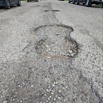 On-Street Bike Lane - Repair at 323 39 Av SE