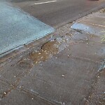 Sidewalk or Curb - Repair at 332 9 Av NE