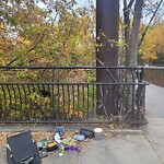 Debris on Street, Sidewalk, Boulevard at 230 21 Av SW