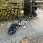 Debris on Street, Sidewalk, Boulevard at 230 21 Av SW