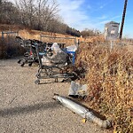 Debris on Street, Sidewalk, Boulevard at 1895 9 Av SW