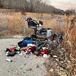 Debris on Street, Sidewalk, Boulevard at 1895 9 Av SW