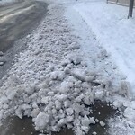 Debris on Street, Sidewalk, Boulevard at 703 Kincora Ba NW