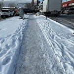 Snow On City - Maintained Sidewalk at 1556 Mardale Wy NE