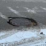 Manhole Damage at 67 Taravista Dr NE