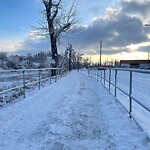 Snow On City - Maintained Sidewalk at 1006 7 St SE