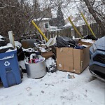 Debris on Backlane at 347 3 Av NE