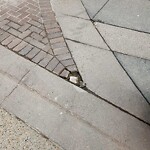 Sidewalk or Curb - Repair at 136 8 Av SE